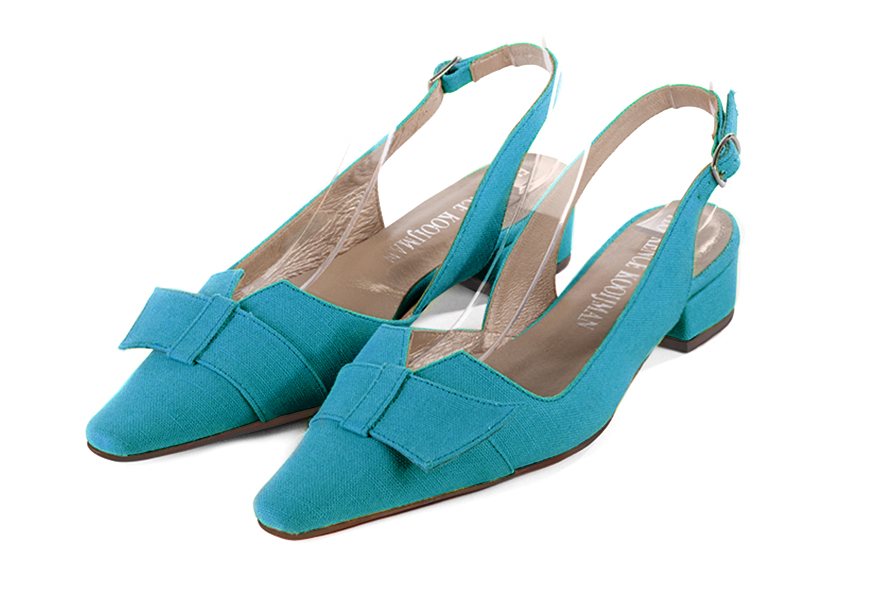 Turquoise blue women's open back shoes, with a knot. Tapered toe. Low block heels. Front view - Florence KOOIJMAN